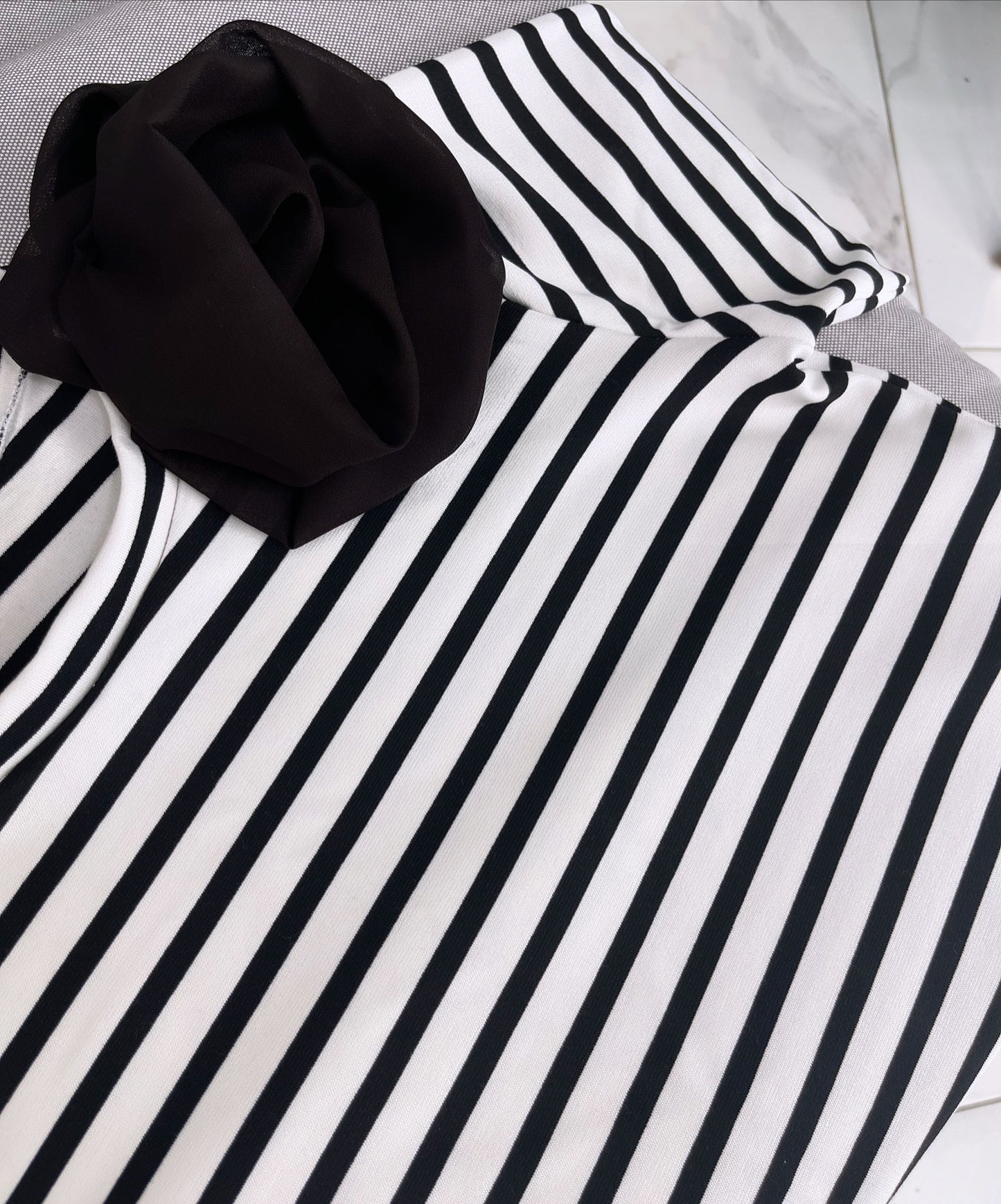 Striped blouse with attached flower, short sleeves